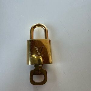 Louis Vuitton Shiny Gold Lock and Key Set
